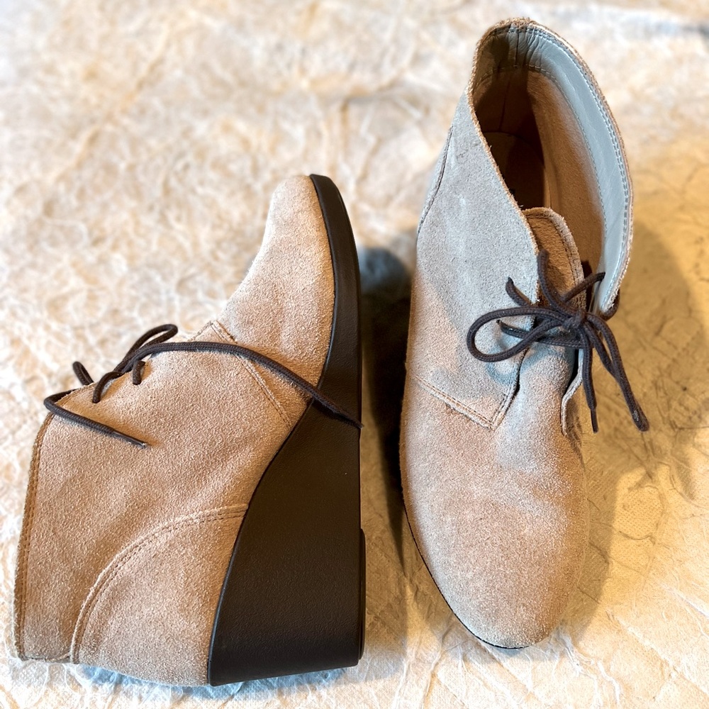 Crocs Dual Comfort Leigh booties. Size 10. Never worn. Suede. Lace-up wedge.